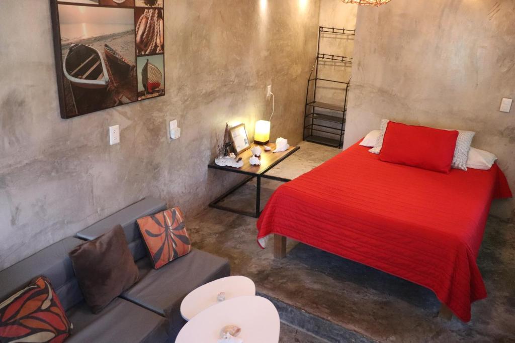 Postel nebo postele na pokoji v ubytování Casita Guayaba