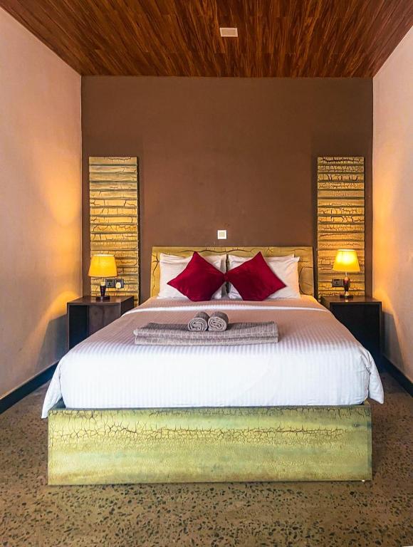 Postel nebo postele na pokoji v ubytování Hotel 198 Negombo