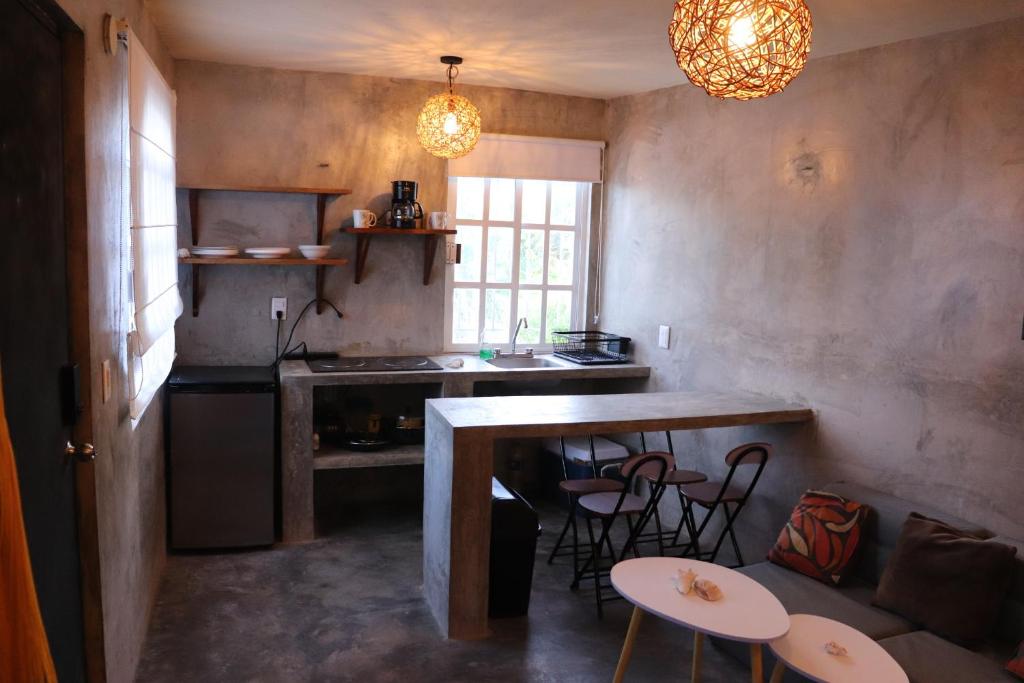 Kuchyň nebo kuchyňský kout v ubytování Casita Guayaba