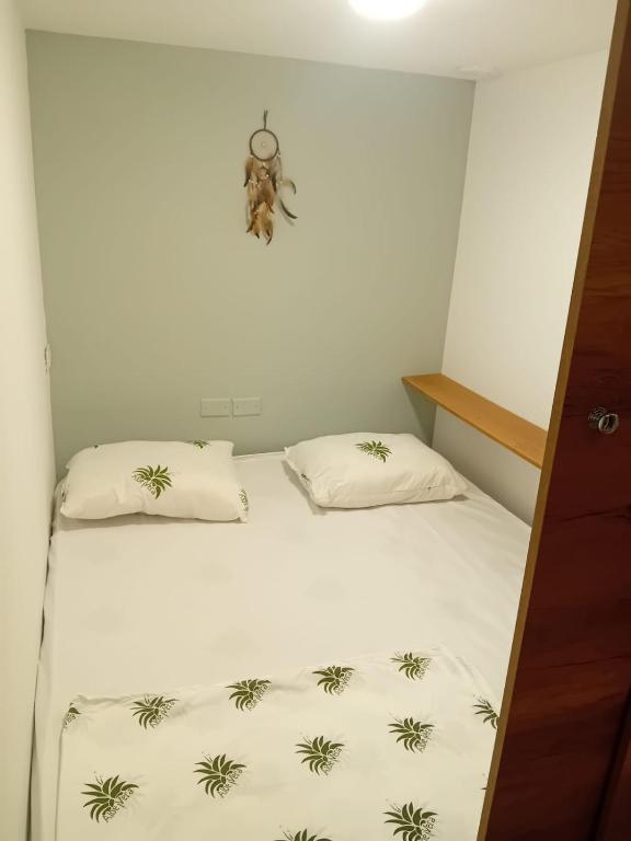 Postel nebo postele na pokoji v ubytování Hotel Kapsul Vlore