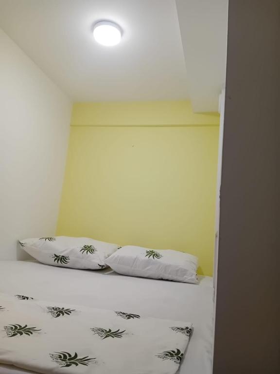 Postel nebo postele na pokoji v ubytování Hotel Kapsul Vlore