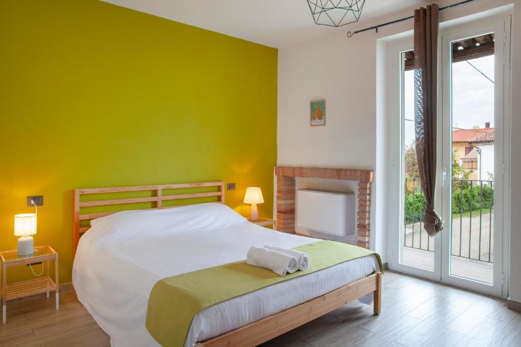 Postel nebo postele na pokoji v ubytování Locanda Stardé