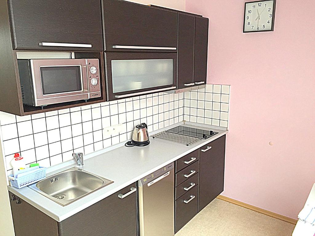 Kuchyň nebo kuchyňský kout v ubytování Apartmány Vojta