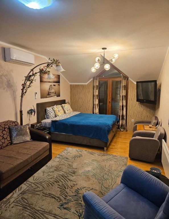 Postel nebo postele na pokoji v ubytování Apartments Aleksandra Cetinje