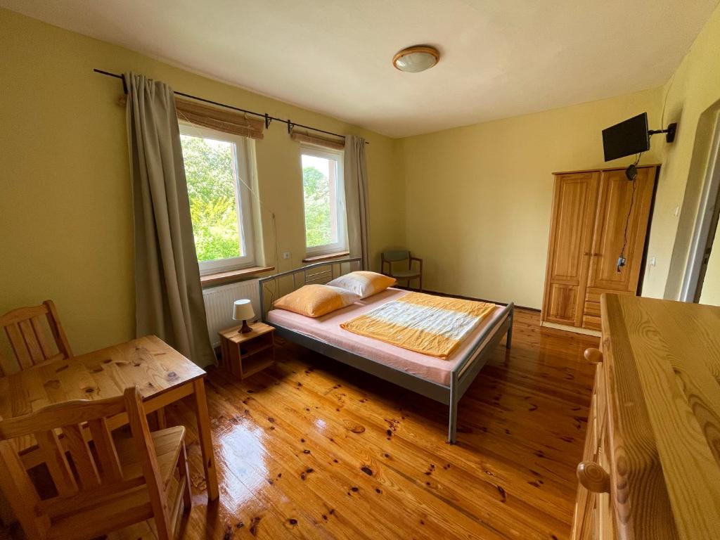 Postel nebo postele na pokoji v ubytování Bros