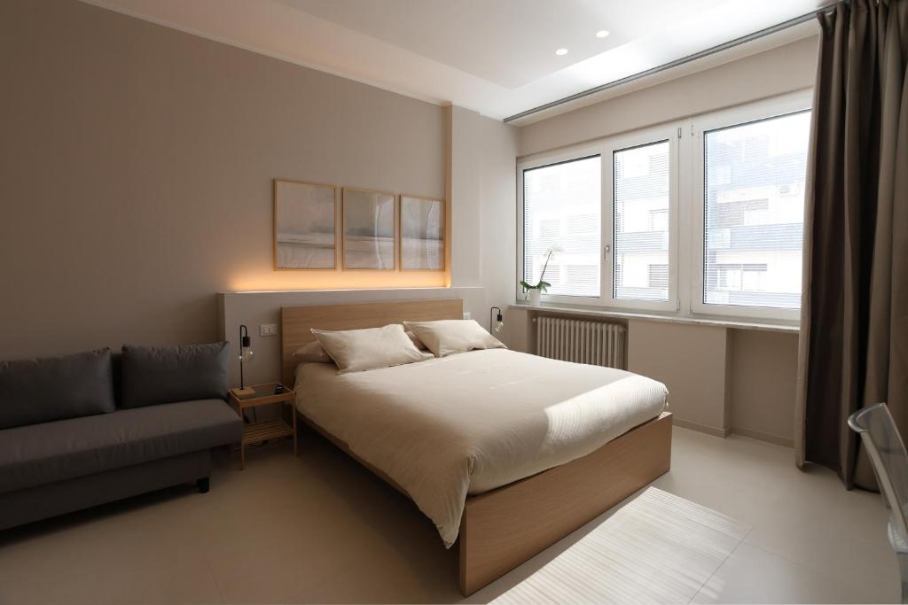 Postel nebo postele na pokoji v ubytování B&B Il Rifugio Urbano