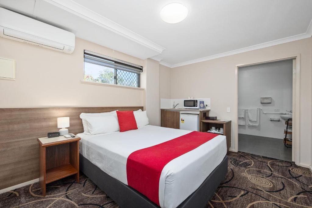 Postel nebo postele na pokoji v ubytování Quality Hotel Bayswater