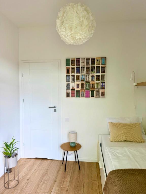 Posteľ alebo postele v izbe v ubytovaní Apartamenty Izerskie - ul. Wczasowa 8