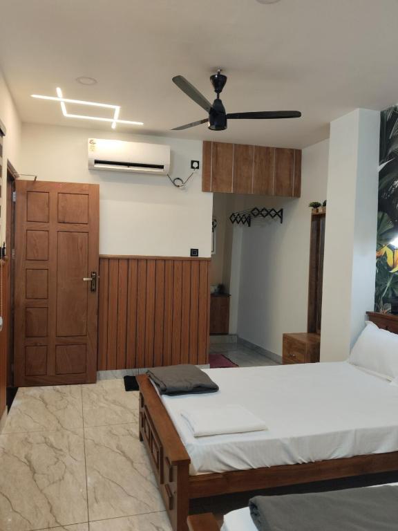Voodi või voodid majutusasutuse Anantha Guest House toas