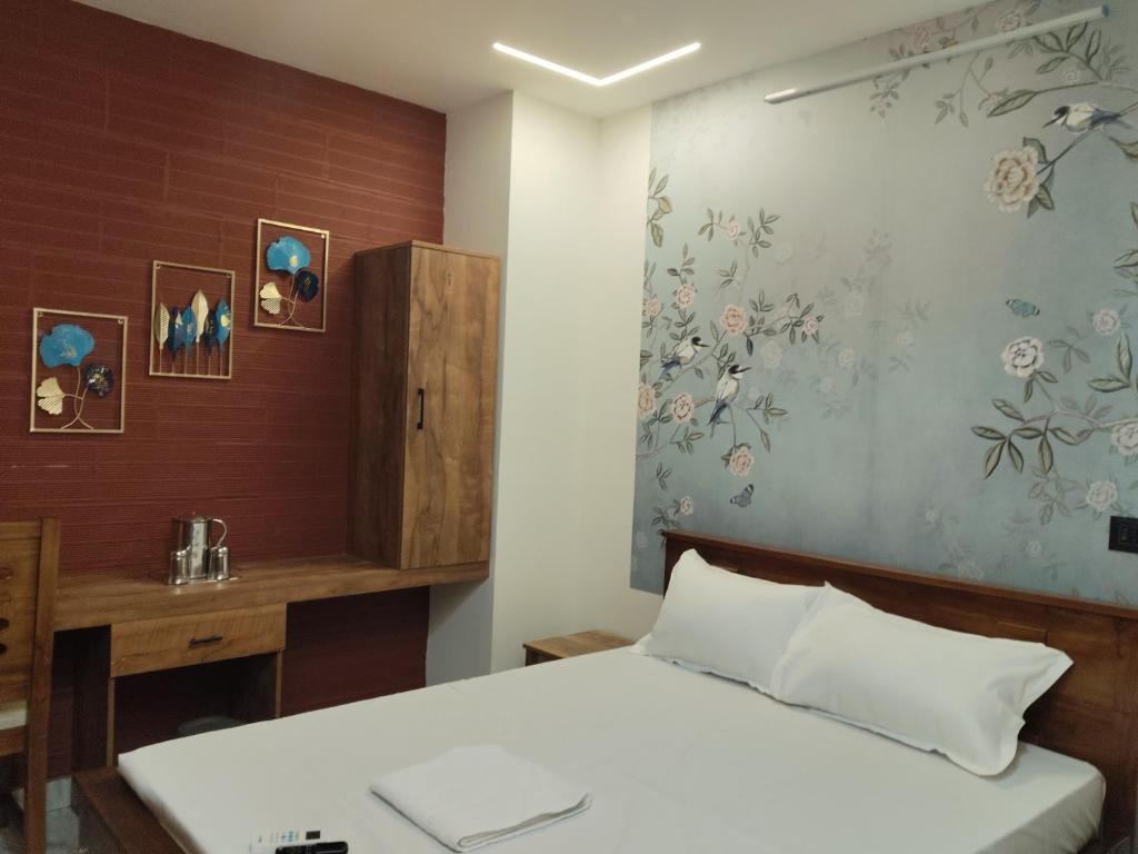 Voodi või voodid majutusasutuse Anantha Guest House toas