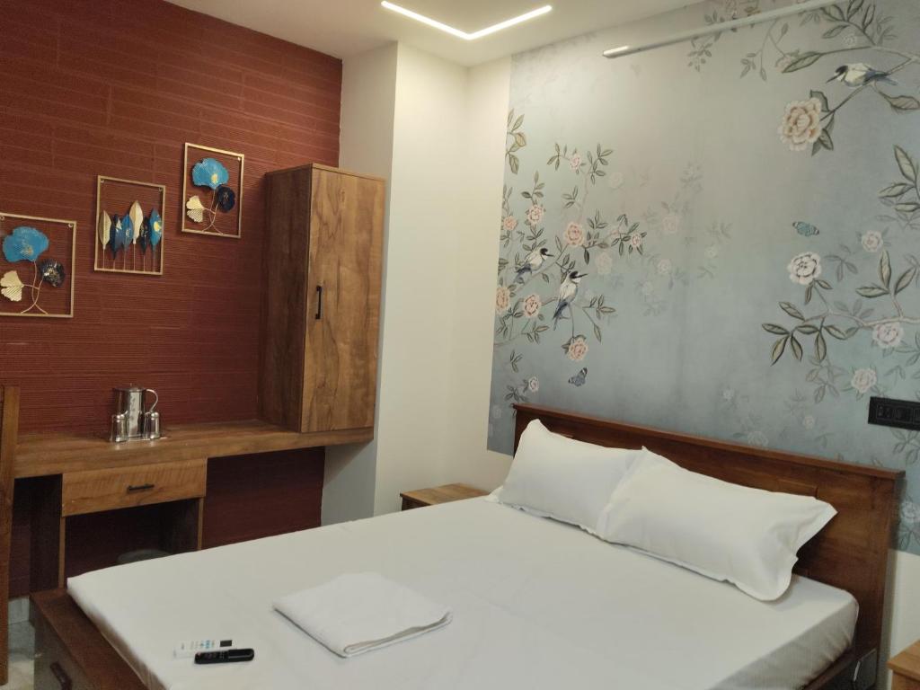 Voodi või voodid majutusasutuse Anantha Guest House toas