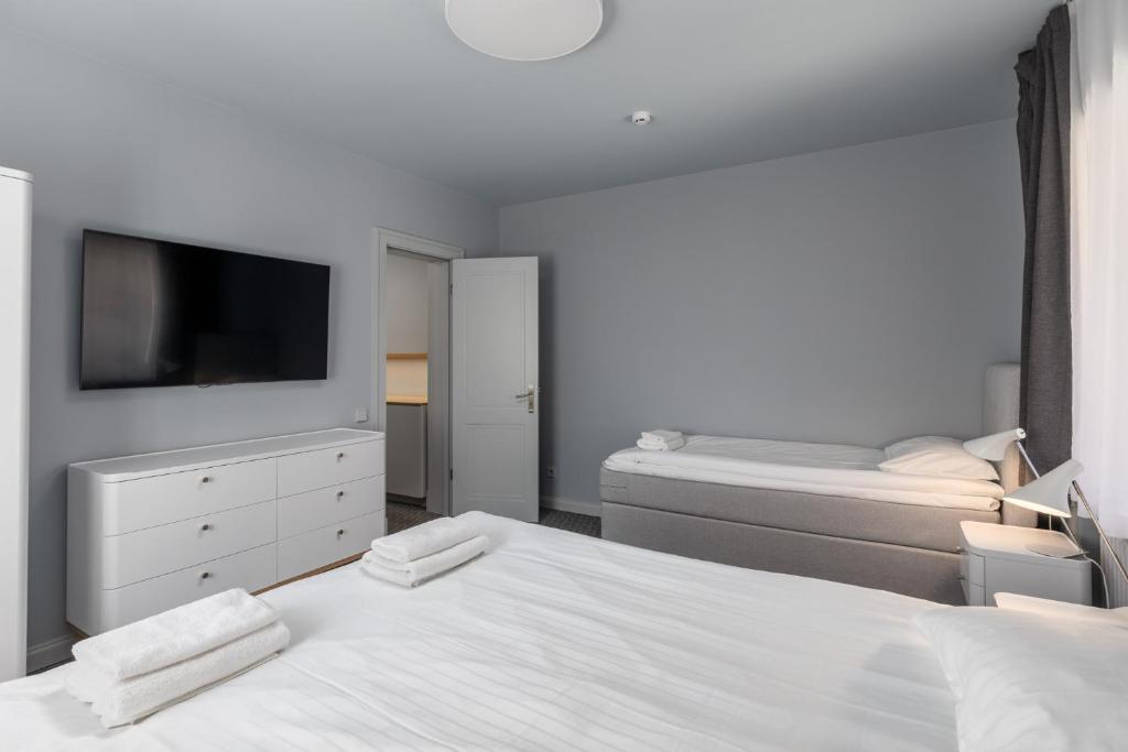 Postel nebo postele na pokoji v ubytování Roze Park Rooms