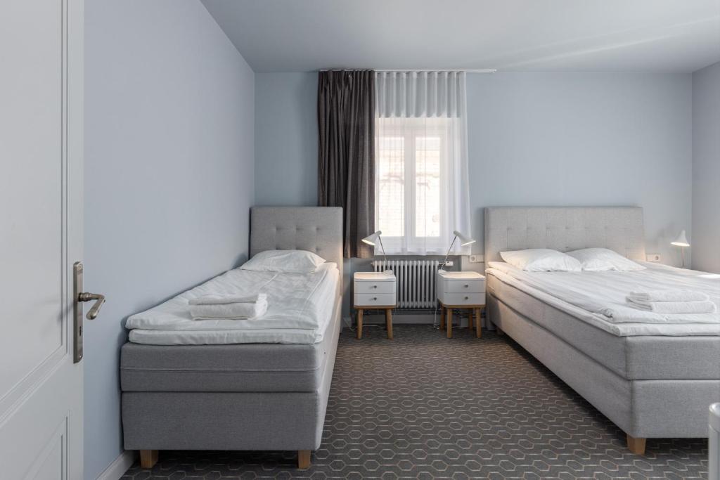 Postel nebo postele na pokoji v ubytování Roze Park Rooms