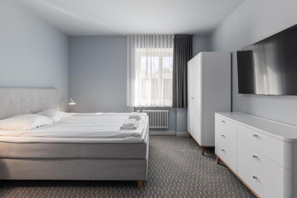 Postel nebo postele na pokoji v ubytování Roze Park Rooms