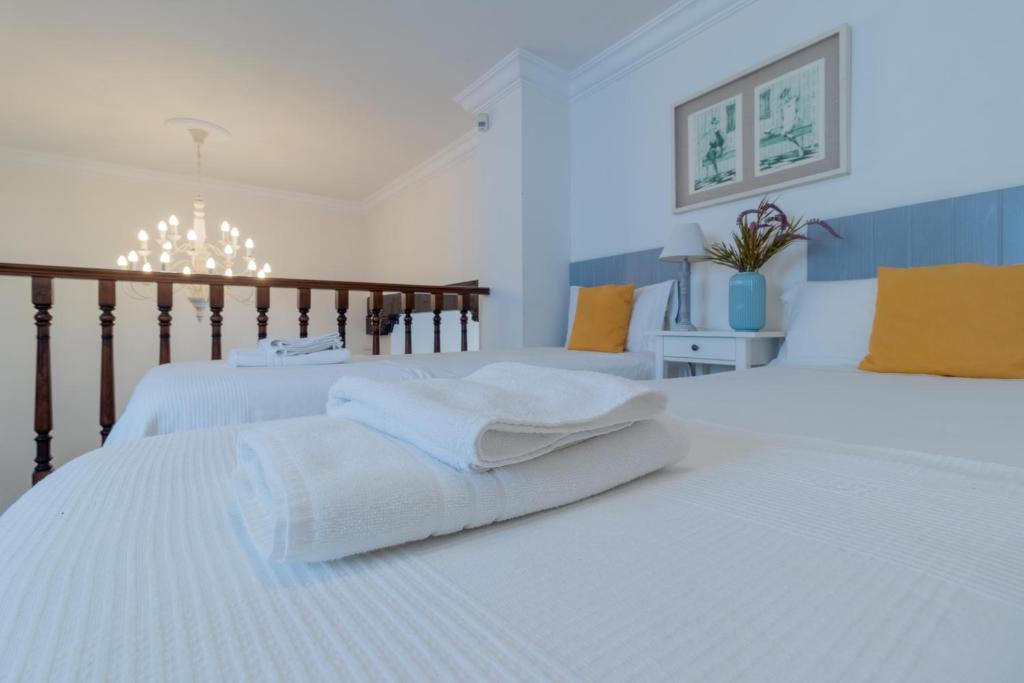 A bed or beds in a room at Cordoba COol Vailima