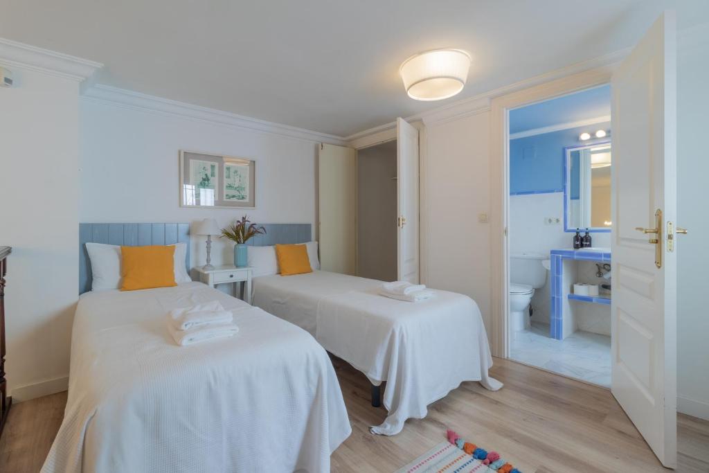 A bed or beds in a room at Cordoba COol Vailima