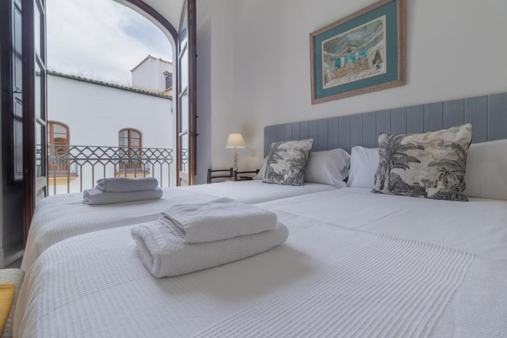 A bed or beds in a room at Cordoba COol Vailima