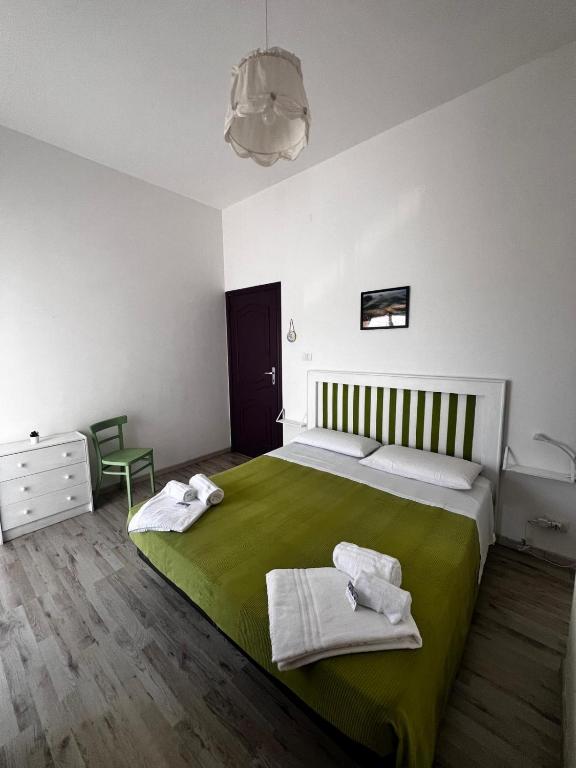 Postel nebo postele na pokoji v ubytování B&B Giallolumia