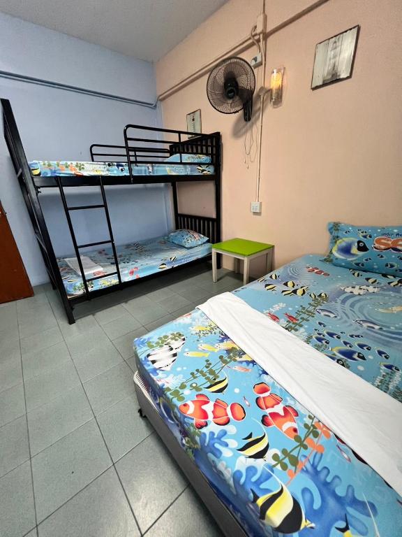 Postel nebo postele na pokoji v ubytování J Mansion