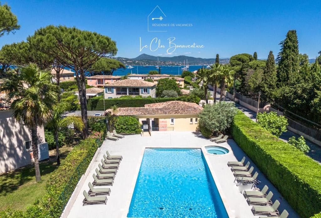 a villa with a swimming pool and a resort at Dolce Vita Plage et St Tropez - 10 in Saint-Tropez