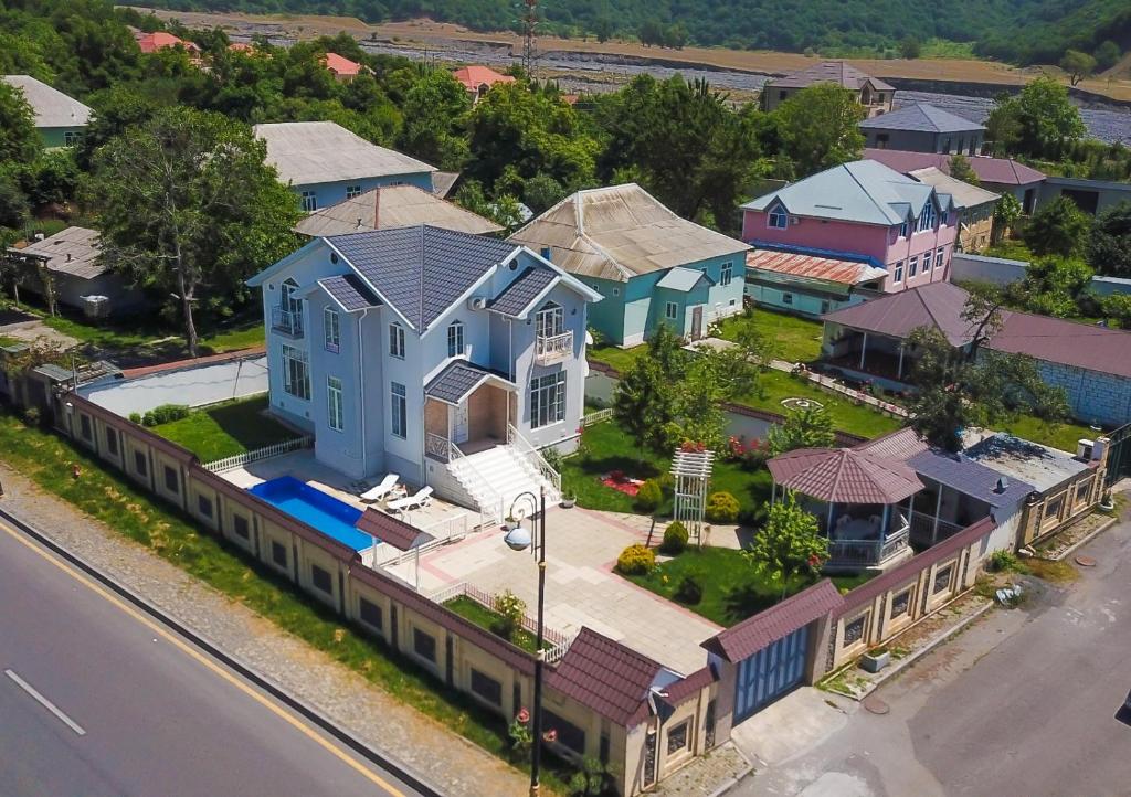 an overhead view of a house with a train at Qafqaz Paradise Villa in Gabala