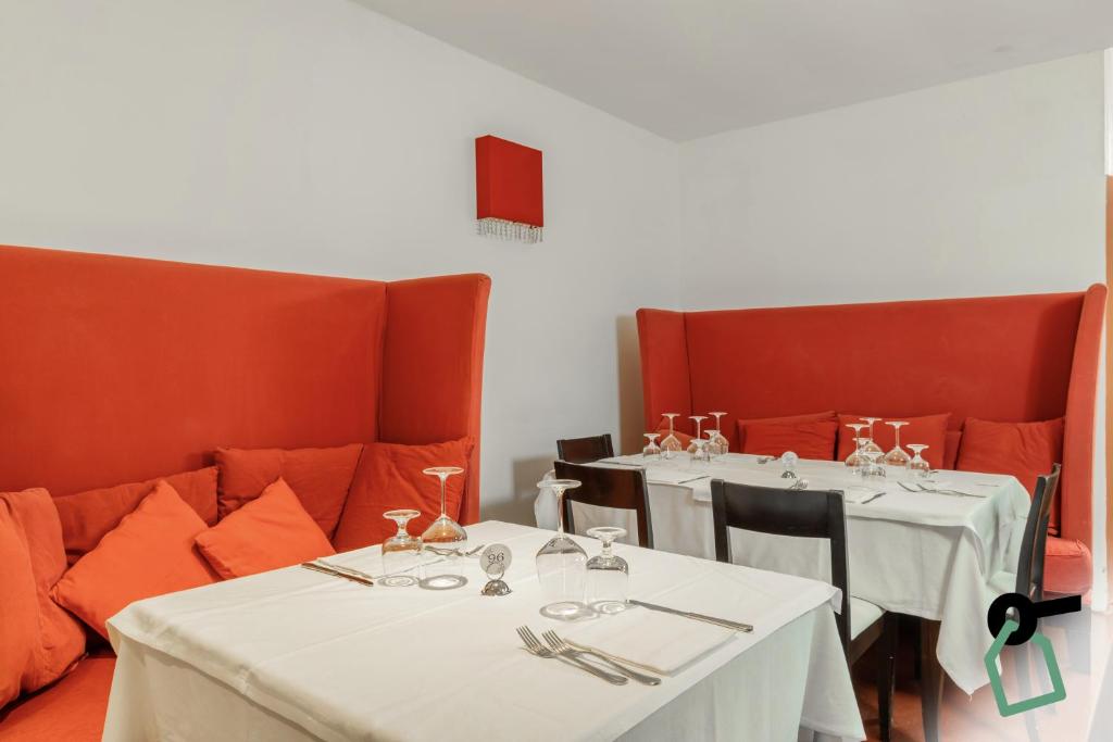 Posezení v ubytování HOTIDAY Room Collection - Stintino