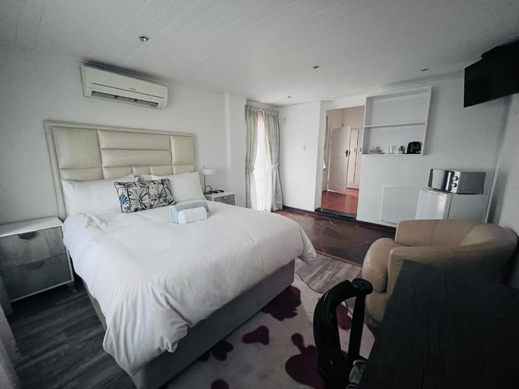 Ένα ή περισσότερα κρεβάτια σε δωμάτιο στο Rest Haven Bed and Breakfast
