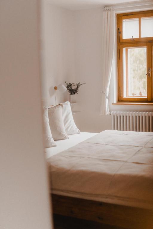 Postel nebo postele na pokoji v ubytování Fajn TAJM Rychleby