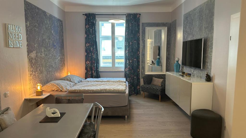 En eller flere senge i et værelse på Ignaz 28 Apartment#1