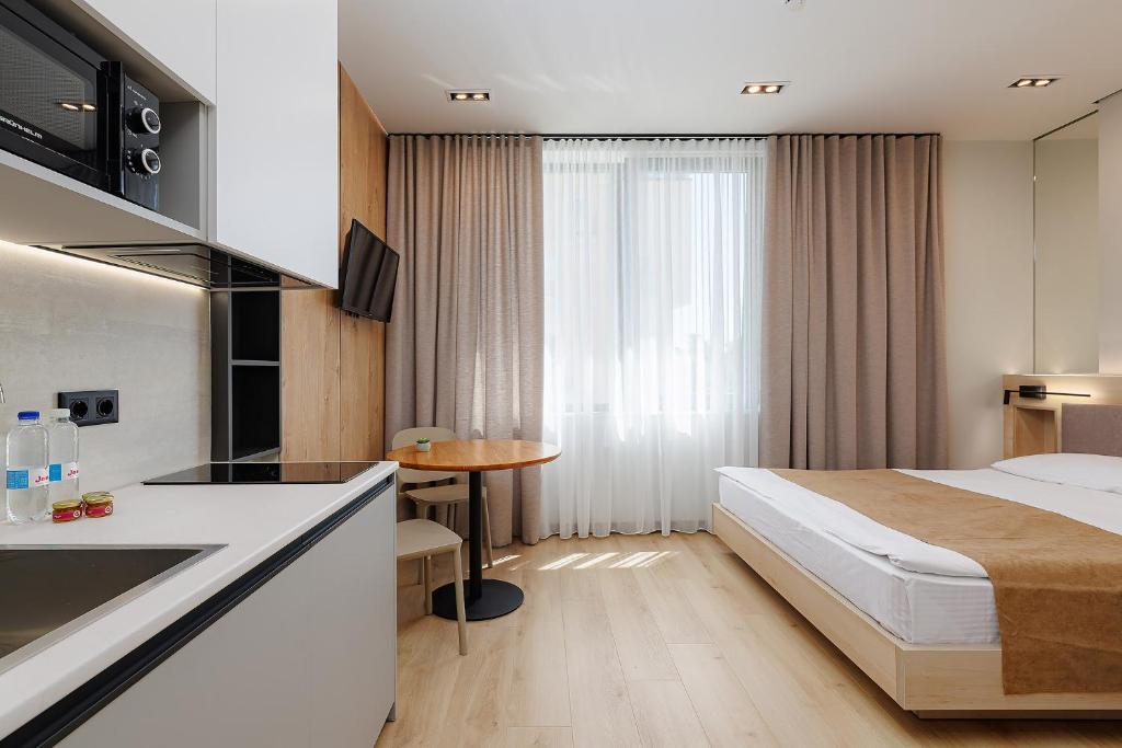 Ліжко або ліжка в номері Jam Apartments Shevchenka