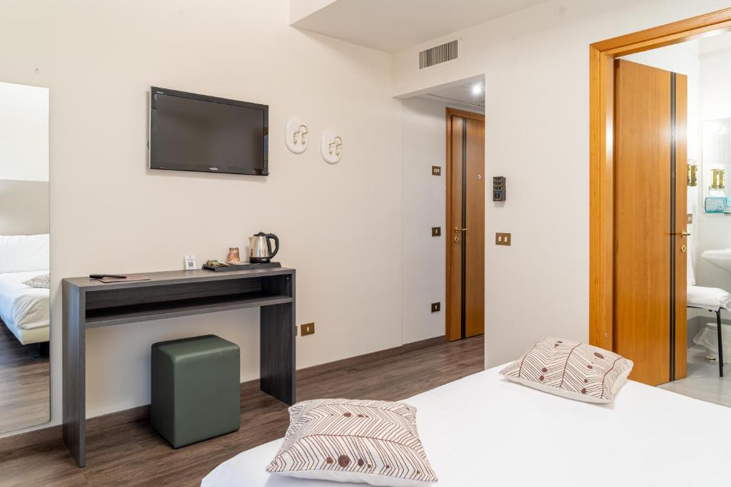 Postel nebo postele na pokoji v ubytování Hotel Désirée - Garda Lake Collection