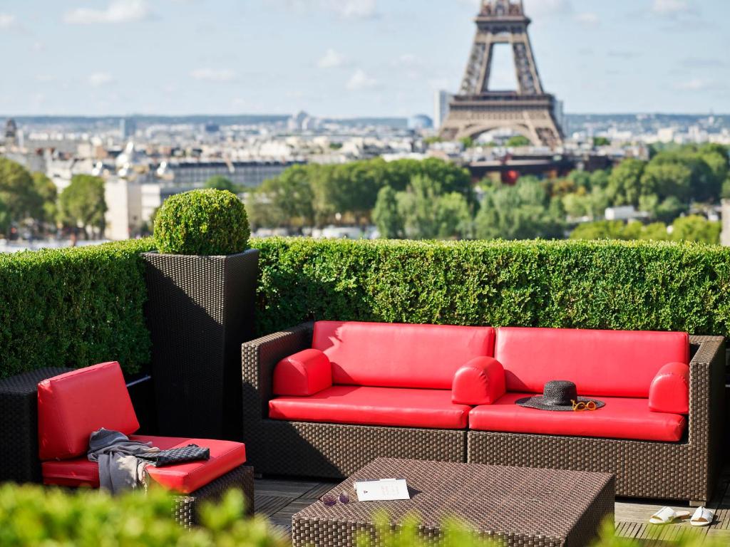 Posezení v ubytování Hôtel Plaza Athénée - Dorchester Collection
