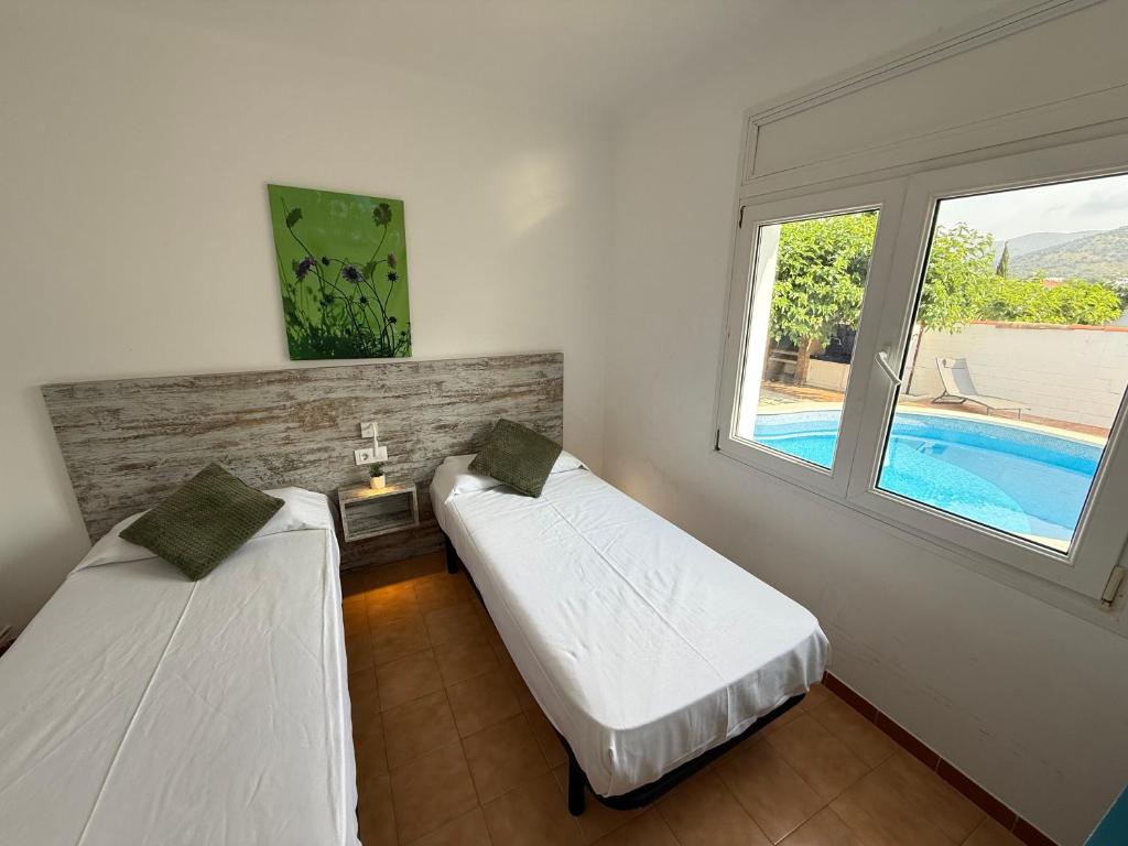 Posteľ alebo postele v izbe v ubytovaní Agi Villa Grecs