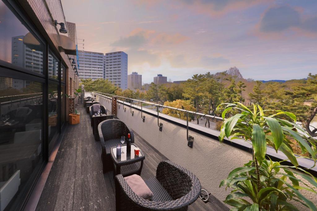 Balkón nebo terasa v ubytování Minamisenri Crystal Hotel