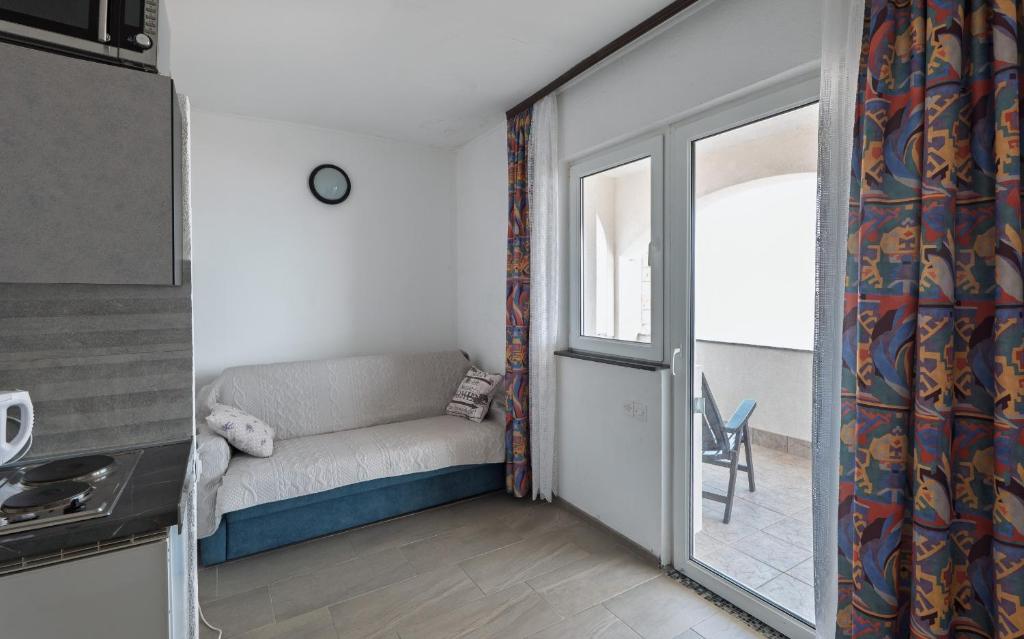 Postel nebo postele na pokoji v ubytování Apartments Kulji