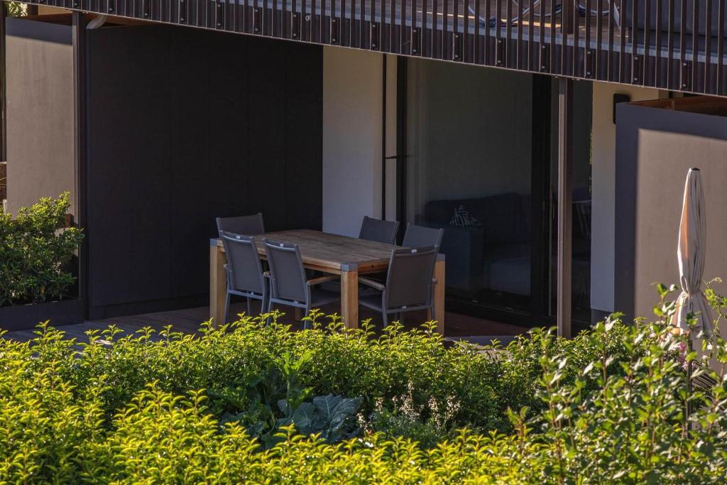 A garden outside Krone Apartments Schruns, Top 6/7/8