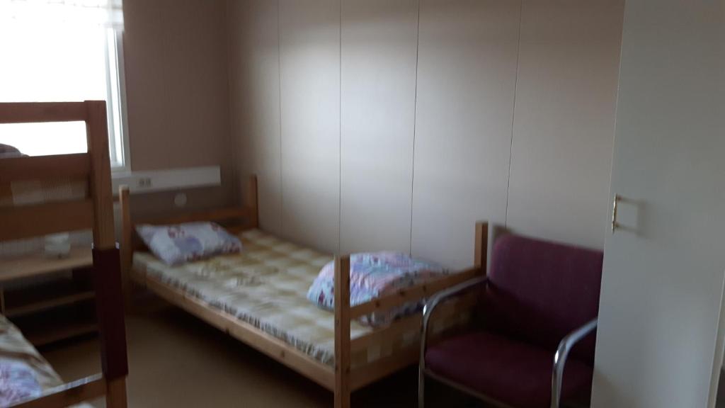 Postel nebo postele na pokoji v ubytování Täljebo Vandrarhem, Sundsbrovägen 1, Söderhamn