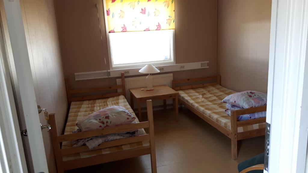 Postel nebo postele na pokoji v ubytování Täljebo Vandrarhem, Sundsbrovägen 1, Söderhamn