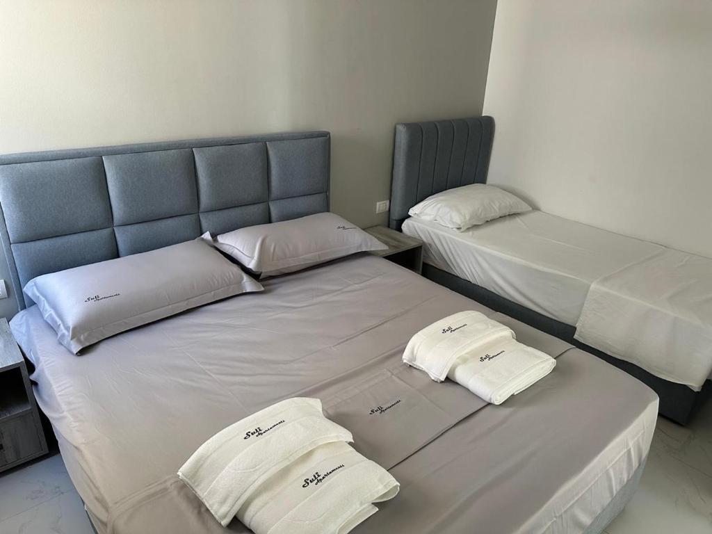 Postel nebo postele na pokoji v ubytování Suli Beach Apartments