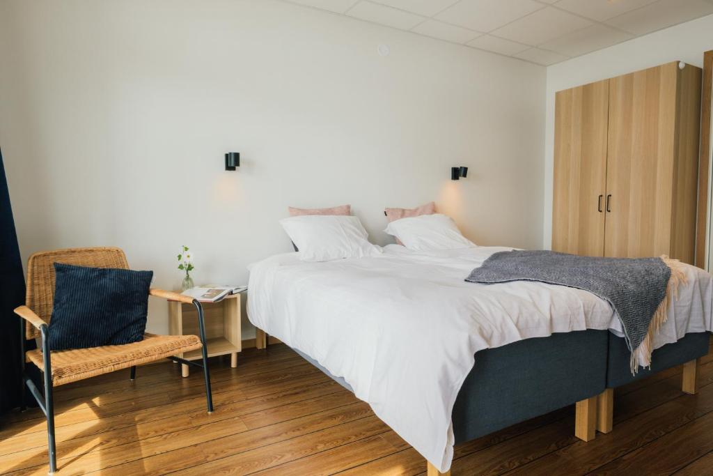 Postel nebo postele na pokoji v ubytování Fridas Hotell
