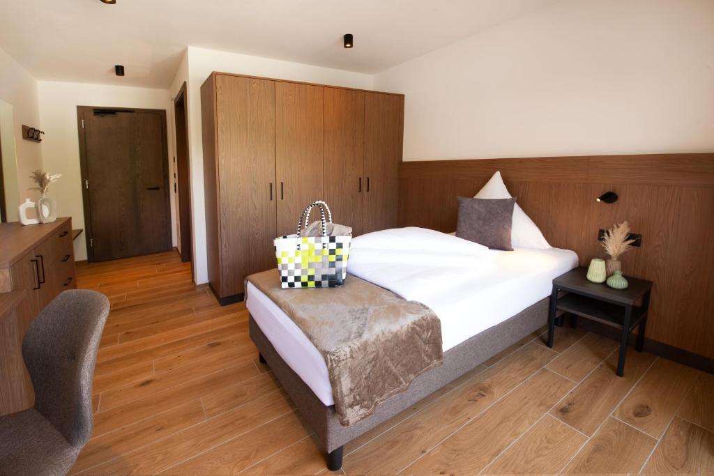Postel nebo postele na pokoji v ubytování Garden Park Hotel