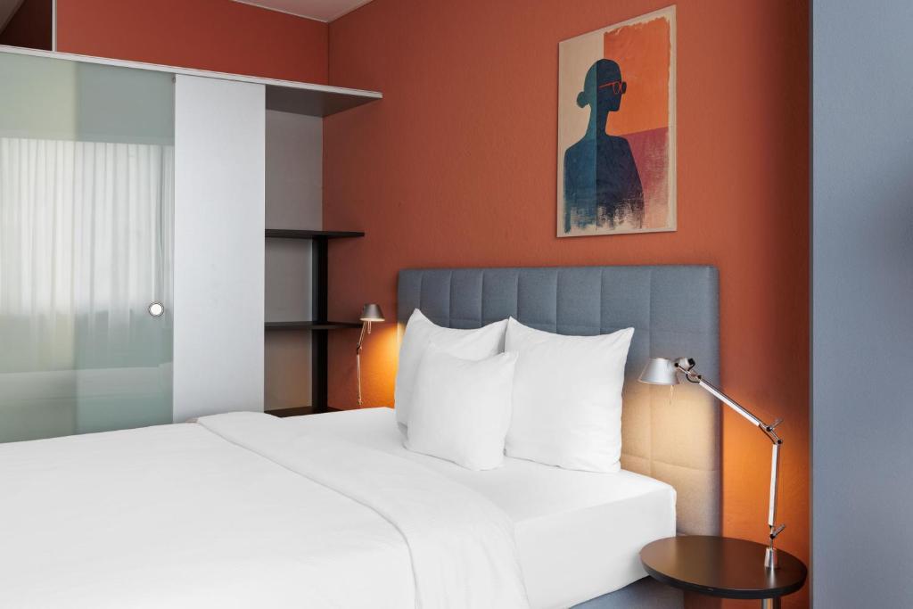Postel nebo postele na pokoji v ubytování Hotel La Pergola