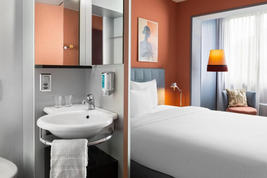 Postel nebo postele na pokoji v ubytování Hotel La Pergola