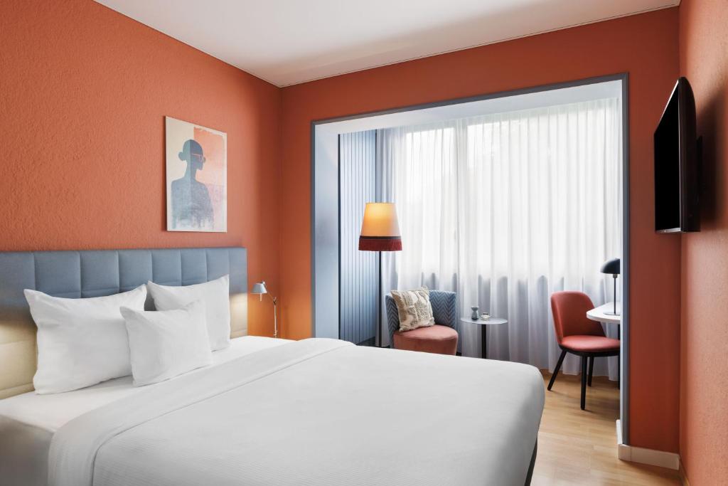 Postel nebo postele na pokoji v ubytování Hotel La Pergola