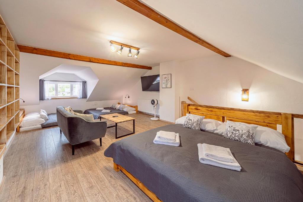 Postel nebo postele na pokoji v ubytování Apartmány Lenkoska