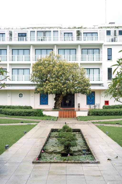 Zahrada ubytování Azerai La Residence, Hue