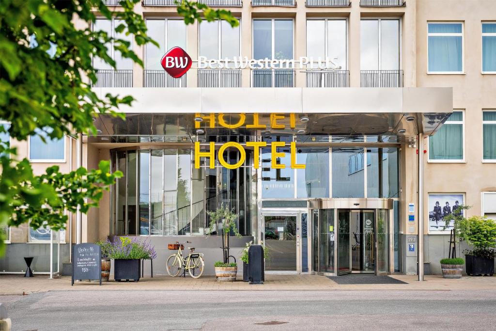 a building with a hotel sign in front of it at Best Western Plus Sthlm Bromma in Stockholm