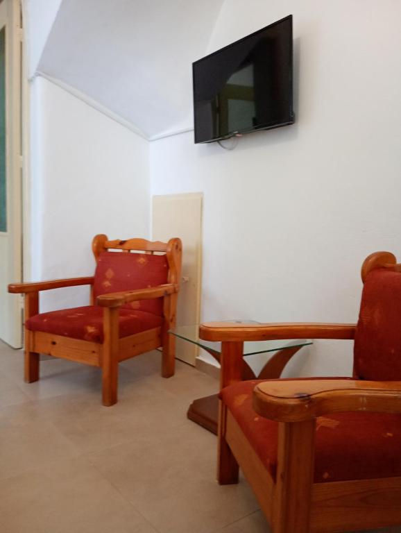TV a/nebo společenská místnost v ubytování Gaios Rest Apartment Comfort Location Paxos Hospitality