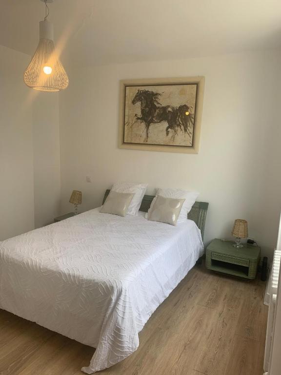 Postel nebo postele na pokoji v ubytování Le Rustic