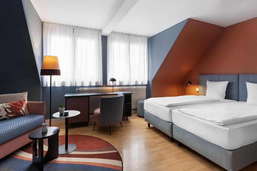 Postel nebo postele na pokoji v ubytování Hotel La Pergola